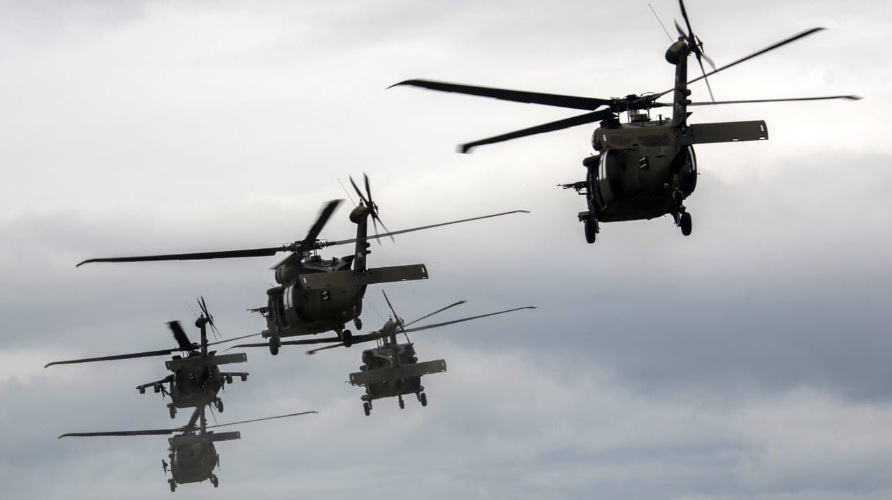 many black helicopters in the sky many black helicopters in the sky