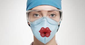 funny face mask woman wearing a mask - warning, nano fibers in medical face masks