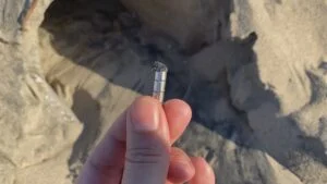 Black powder layer – Graphene - Chemtrail residue on top of beach sand everywhere - Magnet test compressed