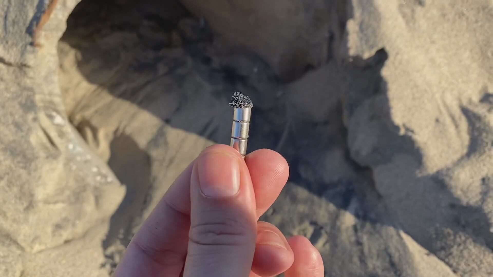 Black powder layer – Graphene – Chemtrail residue on top of beach sand everywhere – Magnet test compressed Black powder layer – Graphene - Chemtrail residue on top of beach sand everywhere - Magnet test compressed
