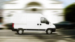 small white van driving