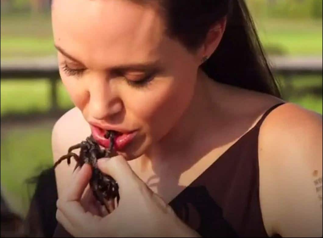 Satanist Angelina Jolie teaches her kids how to eat Bugs and Scorpions