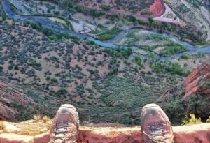 warning - standing on the edge of a cliff - danger