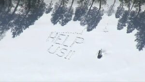 Snow-stranded residents in Southern California writing in snow, HELP US!!